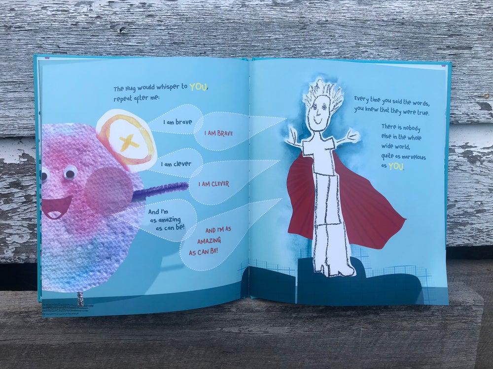 The Hug Hardcover Book tells children that they are brave, clever and amazing. 